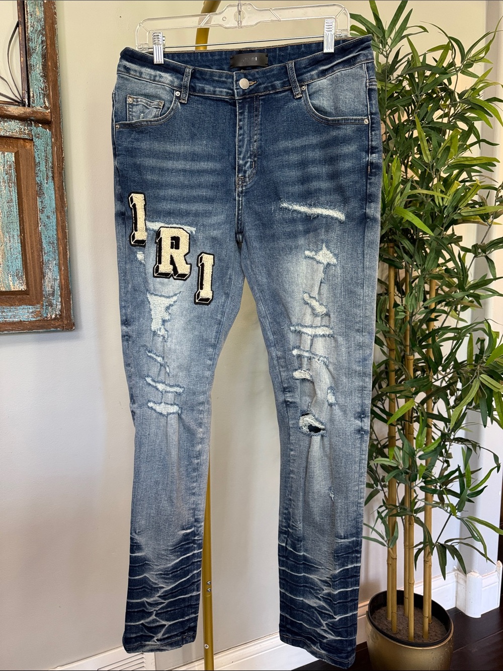 AMIRI Blue Distressed Denim Jeans with LRI Patch